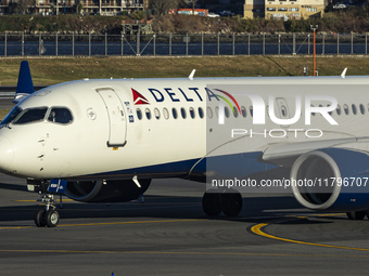 Delta Air Lines Airbus A220-300 passenger aircraft spotted taxiing on the runway and taxiway of LaGuardia airport in NYC. The narrow body Ai...