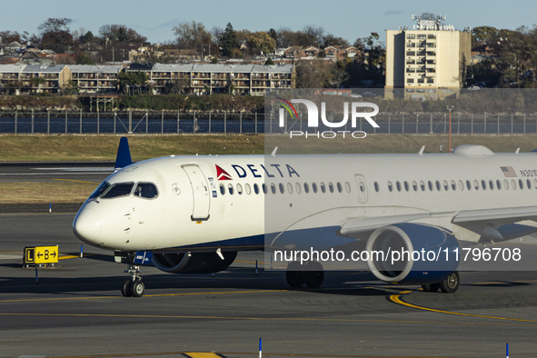 Delta Air Lines Airbus A220-300 passenger aircraft spotted taxiing on the runway and taxiway of LaGuardia airport in NYC. The narrow body Ai...