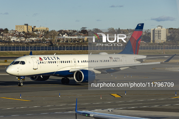 Delta Air Lines Airbus A220-300 passenger aircraft spotted taxiing on the runway and taxiway of LaGuardia airport in NYC. The narrow body Ai...