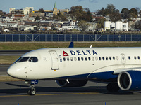 Delta Air Lines Airbus A220-300 passenger aircraft spotted taxiing on the runway and taxiway of LaGuardia airport in NYC. The narrow body Ai...