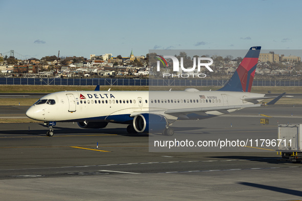 Delta Air Lines Airbus A220-300 passenger aircraft spotted taxiing on the runway and taxiway of LaGuardia airport in NYC. The narrow body Ai...