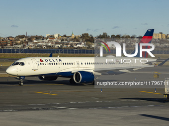 Delta Air Lines Airbus A220-300 passenger aircraft spotted taxiing on the runway and taxiway of LaGuardia airport in NYC. The narrow body Ai...