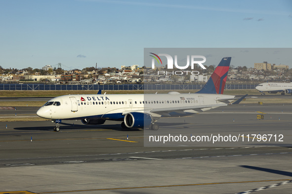 Delta Air Lines Airbus A220-300 passenger aircraft spotted taxiing on the runway and taxiway of LaGuardia airport in NYC. The narrow body Ai...