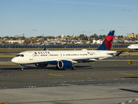 Delta Air Lines Airbus A220-300 passenger aircraft spotted taxiing on the runway and taxiway of LaGuardia airport in NYC. The narrow body Ai...