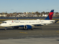 Delta Air Lines Airbus A220-300 passenger aircraft spotted taxiing on the runway and taxiway of LaGuardia airport in NYC. The narrow body Ai...