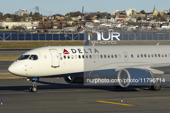 Delta Air Lines Airbus A220-300 passenger aircraft spotted taxiing on the runway and taxiway of LaGuardia airport in NYC. The narrow body Ai...