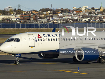 Delta Air Lines Airbus A220-300 passenger aircraft spotted taxiing on the runway and taxiway of LaGuardia airport in NYC. The narrow body Ai...