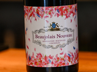 KRAKOW, POLAND - NOVEMBER 20:   
A wine label of a freshly arrived bottle of Beaujolais Nouveau displayed inside a wine bar in Krakow's Old...