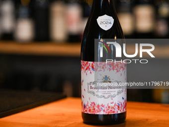 KRAKOW, POLAND - NOVEMBER 20:   
A freshly arrived bottle of Beaujolais Nouveau displayed inside a wine bar in Krakow's Old Town on the eve...