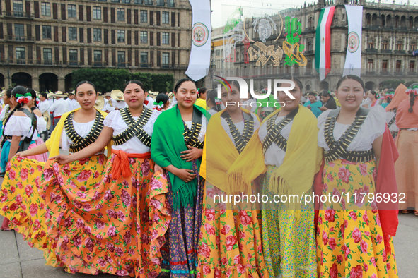 Women dressed as Adelitas, who participate in the Mexican Revolution, are seen before the parade on the occasion of the 114th anniversary of...