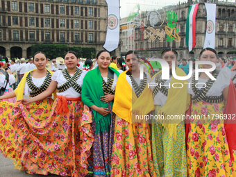 Women dressed as Adelitas, who participate in the Mexican Revolution, are seen before the parade on the occasion of the 114th anniversary of...