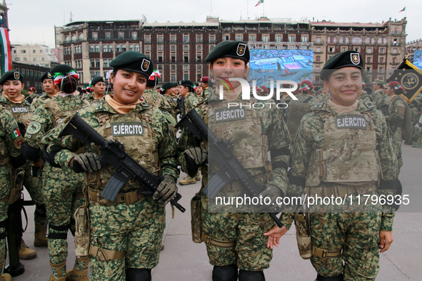 Women belonging to the Mexican Army pose before the parade on the occasion of the 114th anniversary of the Mexican Revolution at the Zocalo...