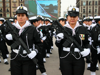 Women belonging to the Mexican Navy pose before the parade for the 114th anniversary of the Mexican Revolution at the Zocalo capital in Mexi...