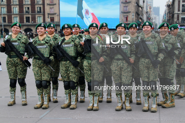 Women belonging to the Mexican Army pose before the parade on the occasion of the 114th anniversary of the Mexican Revolution at the Zocalo...