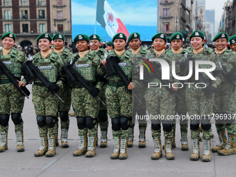 Women belonging to the Mexican Army pose before the parade on the occasion of the 114th anniversary of the Mexican Revolution at the Zocalo...