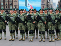 Women belonging to the Mexican Army pose before the parade on the occasion of the 114th anniversary of the Mexican Revolution at the Zocalo...