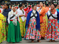 Women dressed as Adelitas, who participate in the Mexican Revolution, are seen before the parade on the occasion of the 114th anniversary of...