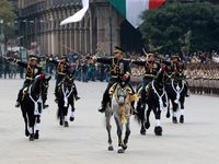 Members of the Mexican armed forces, mounted on horses, take part in the parade marking the 114th anniversary of the Mexican Revolution at t...