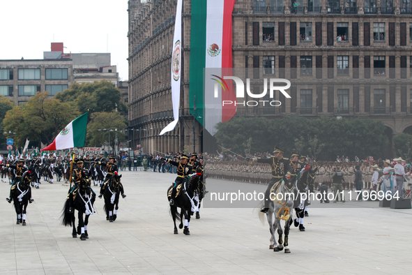 Members of the Mexican armed forces, mounted on horses, take part in the parade marking the 114th anniversary of the Mexican Revolution at t...