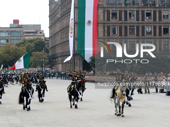 Members of the Mexican armed forces, mounted on horses, take part in the parade marking the 114th anniversary of the Mexican Revolution at t...