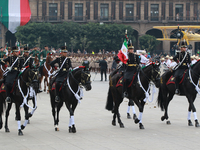 Members of the Mexican armed forces, mounted on horses, take part in the parade marking the 114th anniversary of the Mexican Revolution at t...