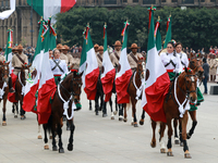 Members of the Mexican armed forces, mounted on horses, take part in the parade marking the 114th anniversary of the Mexican Revolution at t...