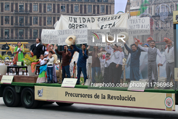 Members of the Mexican armed forces, dressed as during the Mexican Revolution, perform a scene from the Mexican Revolution titled Precursors...