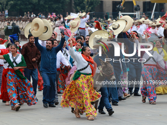 Members of the Mexican armed forces dress as they were during the Mexican Revolution and take part in a parade marking the 114th anniversary...