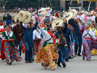 Members of the Mexican armed forces dress as they were during the Mexican Revolution and take part in a parade marking the 114th anniversary...