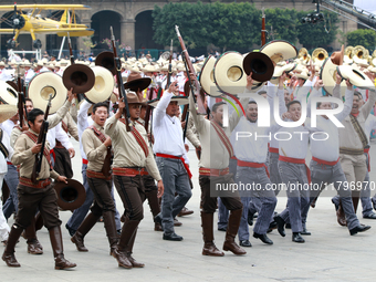 Members of the Mexican armed forces dress as they were during the Mexican Revolution and take part in a parade marking the 114th anniversary...