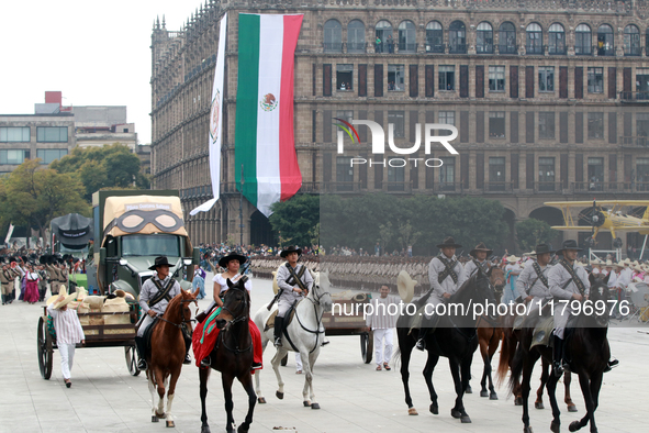 Members of the Mexican armed forces, mounted on horses, take part in the parade marking the 114th anniversary of the Mexican Revolution at t...