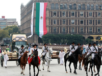 Members of the Mexican armed forces, mounted on horses, take part in the parade marking the 114th anniversary of the Mexican Revolution at t...