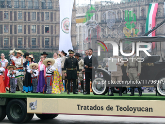 Members of the Mexican armed forces, dressed in attire from the time of the Mexican Revolution, represent a scene from the Mexican Revolutio...