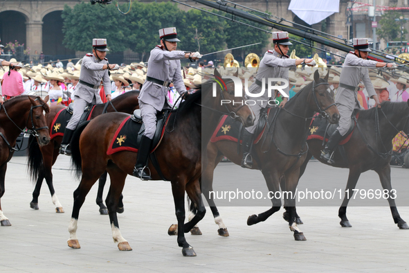 Members of the Mexican armed forces, mounted on horses, take part in the parade marking the 114th anniversary of the Mexican Revolution at t...