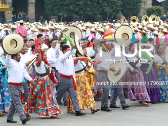 Members of the Mexican armed forces dress as they were during the Mexican Revolution and take part in a parade marking the 114th anniversary...