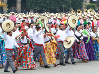 Members of the Mexican armed forces dress as they were during the Mexican Revolution and take part in a parade marking the 114th anniversary...