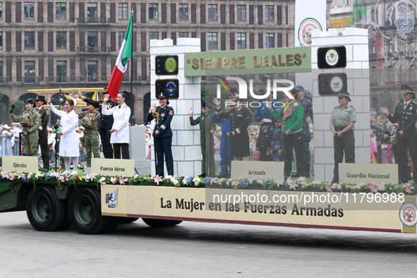 Women members of the armed forces take part in the parade marking the 114th anniversary of the Mexican Revolution at the Zocalo in Mexico Ci...