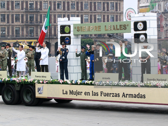 Women members of the armed forces take part in the parade marking the 114th anniversary of the Mexican Revolution at the Zocalo in Mexico Ci...