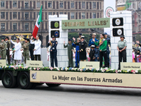 Women members of the armed forces take part in the parade marking the 114th anniversary of the Mexican Revolution at the Zocalo in Mexico Ci...