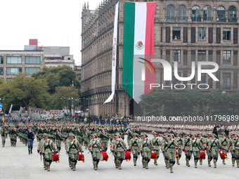 Women belonging to the Mexican Army participate in the parade on the occasion of the 114th anniversary of the Mexican Revolution at the capi...