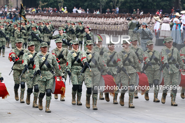 Women belonging to the Mexican Army participate in the parade on the occasion of the 114th anniversary of the Mexican Revolution at the capi...