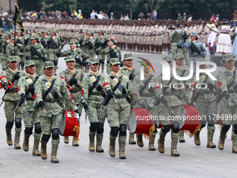 Women belonging to the Mexican Army participate in the parade on the occasion of the 114th anniversary of the Mexican Revolution at the capi...