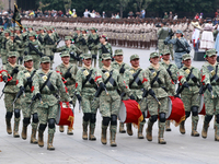 Women belonging to the Mexican Army participate in the parade on the occasion of the 114th anniversary of the Mexican Revolution at the capi...