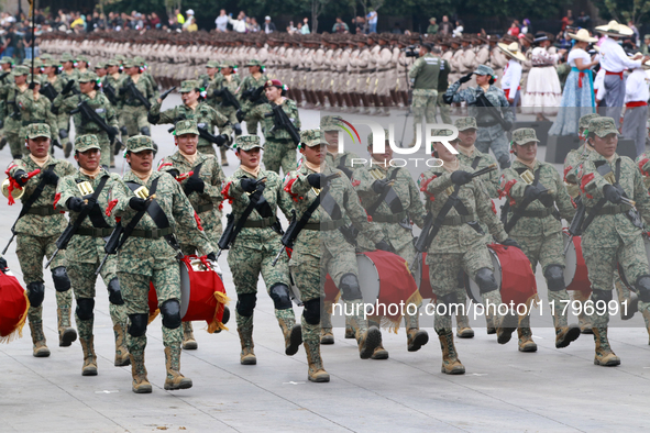 Women belonging to the Mexican Army participate in the parade on the occasion of the 114th anniversary of the Mexican Revolution at the capi...