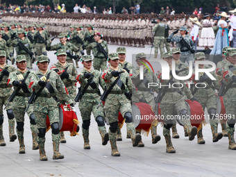 Women belonging to the Mexican Army participate in the parade on the occasion of the 114th anniversary of the Mexican Revolution at the capi...