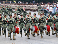 Women belonging to the Mexican Army participate in the parade on the occasion of the 114th anniversary of the Mexican Revolution at the capi...