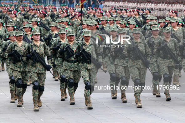 Women belonging to the Mexican Army participate in the parade on the occasion of the 114th anniversary of the Mexican Revolution at the capi...