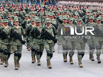 Women belonging to the Mexican Army participate in the parade on the occasion of the 114th anniversary of the Mexican Revolution at the capi...