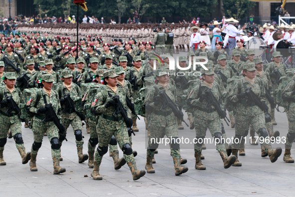 Women belonging to the Mexican Army participate in the parade on the occasion of the 114th anniversary of the Mexican Revolution at the capi...