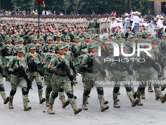 Women belonging to the Mexican Army participate in the parade on the occasion of the 114th anniversary of the Mexican Revolution at the capi...